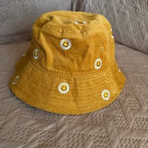 Corduroy smiley face embroidered bucket hat